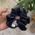 Lustrous navy blue satin scrunchie with branded ALLINE label and metallic charm accessory - Scrunchie (PU Leather Texture) / Navy Blue