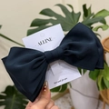 Elegant large navy blue silk texture bow hair clip displayed on a branded card - Blue Bowknot Spring Clip