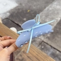 Detail of light blue acetate hair claw clip with silk ribbon bow and sparkling rhinestones - Jelly Blue - Ribbon Bow