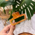Elegant amber acetate shark hair claw clip with golden label Barrette La France lettering - Coffee Amber