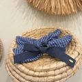 French style blue checkered headband with a navy blue bow on a woven tray - Blue Plaid With Solid Denim Bow