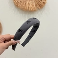 Eleganter grauer Haarreif aus Stoff mit schwarzen Schleifen für voluminöses Haar - Grau
