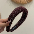 Detailed close-up of wine red tweed knit headband with black and white woven pattern - Dark Red Black and White Spotted Wool Headband