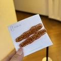 Par de pinzas para el cabello de acetato ondulado con patrón de carey ámbar - Estampado de leopardo