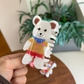 Detail of pearlescent acrylic bear hair claw clip with colorful hand-painted accents - Mermaid White Yellow Clothes Bear