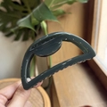 Detailed side view of dark green hollow semi-circular hair claw clip for elegant styling - 10cm / Dark Green