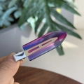 Detailed macro view of purple-blue gradient resin hair clip with silver metal accents - Transparent Purple Red