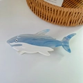 Shark-shaped acetate hair claw clip featuring a blue and white marble pattern design - Blue
