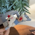 Cute plush bear hair claw clip with blue checkered pattern and red cherry detail - Blue Plaid - Laying White Dog Claw Clip