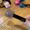 Detail of bear acetate hair clip featuring gold France Handmade lettering - Deep Lotus Pink Bear Duck Clip