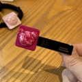 Close-up of pink bear hair clip with gold France Handmade text on the black grip - Rose Pink Bear Duck Clip