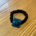 Detail of bear hair tie with cyan resin bear head on black crinkle fabric scrunchie - Peacock Blue Bear Hair Tie