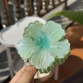 Detail of aurora green translucent flower hair claw clip with pearlescent laser finish - Five-Petal Claw / Mint Green Laser-Green Stamen