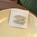 Elegantes pinzas para el cabello ovaladas de acetato irisado con acabado perlado - Blanco Iridiscente