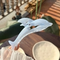 Elegant dolphin-shaped pearlescent blue hair claw clip with a shimmering shell finish - Sparkling Blue Clear Dolphin Claw