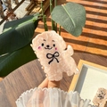 Cute puppy acetate hair claw clip with black bow on warm sunlit wooden table - Soft Pink Smiling Bow Puppy