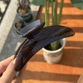 Large crescent moon hair claw clip in glossy coffee brown acrylic for thick hair styling - Transparent Brown