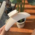 Minimalist moon-shaped cream hair claw clip with a sleek curved resin design for women - Ivory