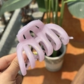 Detail of lavender purple resin hair claw clip with golden glitter and multi-tooth design - Pink Purple Shimmer Pumpkin Claw