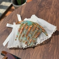 Detail of handmade acetate hair comb with mint green and orange marble texture on wood - Blue Brown Marble Texture
