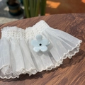 Detail of light blue floral clip on delicate white lace mesh sleeve ruffles - Light Blue