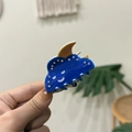Close-up of cute blue cloud hair claw clip with white rhinestones and yellow moon detail - Dark Blue