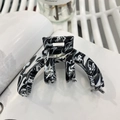 Elegante pinza per capelli in acetato marmorizzato bianco e nero con logo France Handmade - Zebra Print