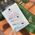 Set di 4 mollette BB con motivi a cuore e stella per ragazze in stile sale marino - Rosa Stella Griglia