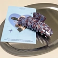 Chic marbled acetate hair claw clip with red and blue pattern on a metallic tray - Square Edge Claw Clip / Taro Chocolate Lava