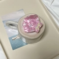 Pinza rosa para el pelo en forma de concha con lazo amarillo sobre base cerámica - Estilo de Lazo de Concha con Textura de Nube Rosa