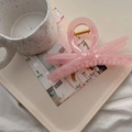 Translucent pastel pink bow hair claw clip with golden spring on a cream tray - 13.5cm / Jelly Pink (X Bow)