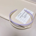 Set of two candy colored non-slip headbands in light purple and creamy white with teeth - Taro Purple + Off-White