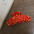 Detail view of red star pattern acetate hair claw clip with strong metal spring - Star Red - Seven-Tooth Claw (Approx. 10.5cm)