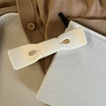 Detail of elegant creamy white acetate bow hair clip placed on a stylish desktop background - Solid White