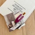 Detail of purple French acetate hair clip with gold metal base and side branding - Rose Pink