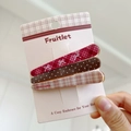 Three-piece hair clip set featuring red plaid bows and sweet love patterns on display card - Red Coffee - Bowknot Polka Dot - Cosmetic Clip Combo