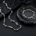 Miteinander verbundenes silbernes Titanschmuckset mit gewelltem Perlenkettendesign - Halskette Armband Set (L1102+S1102)
