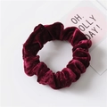Elastic velvet scrunchie in wine red finish for elegant hair styling and wrist accessory - Burgundy