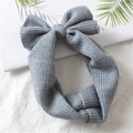 Close-up of heather grey ribbed knit baby headband with a large decorative soft bow - Blue Gray