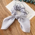 Lilac purple satin scrunchie with long bow ribbons placed on a white aesthetic card - Light Gray