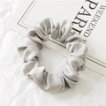 Elegant silver grey satin scrunchie with smooth silk texture and ruched design for women - Gray