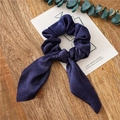 Dark blue satin hair scrunchie with long ribbon bow on wooden background - Navy Blue