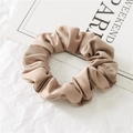 Elegant champagne satin scrunchie with soft silk texture and rich pleated design - Khaki