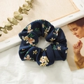 Navy blue floral scrunchie with white and yellow flowers on a textured fabric - Navy Blue
