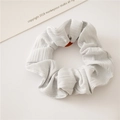 Minimalist light grey pleated hair scrunchie in fine ribbed knit fabric on white background - Light Blue