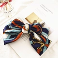Three-layer satin bow hair clip featuring classic chain belt print in navy and orange - Chain Navy Blue