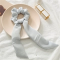 Light blue chiffon scrunchie with long ribbons and elegant pleated texture on ceramic tray - Light Blue Ribbed