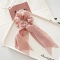 Pink chiffon scrunchie with long ribbons and elegant pleats on white tray - Korean Pink