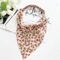 Close-up of vintage floral triangle hair kerchief with elastic band on white background - Pink White Rose Bandana