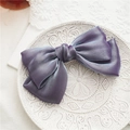 Elegant purple satin double-layered bow hair clip on a decorative white porcelain plate - Gray